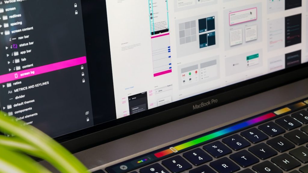 A close up of the Google Material design sticker sheet on a MacBook.